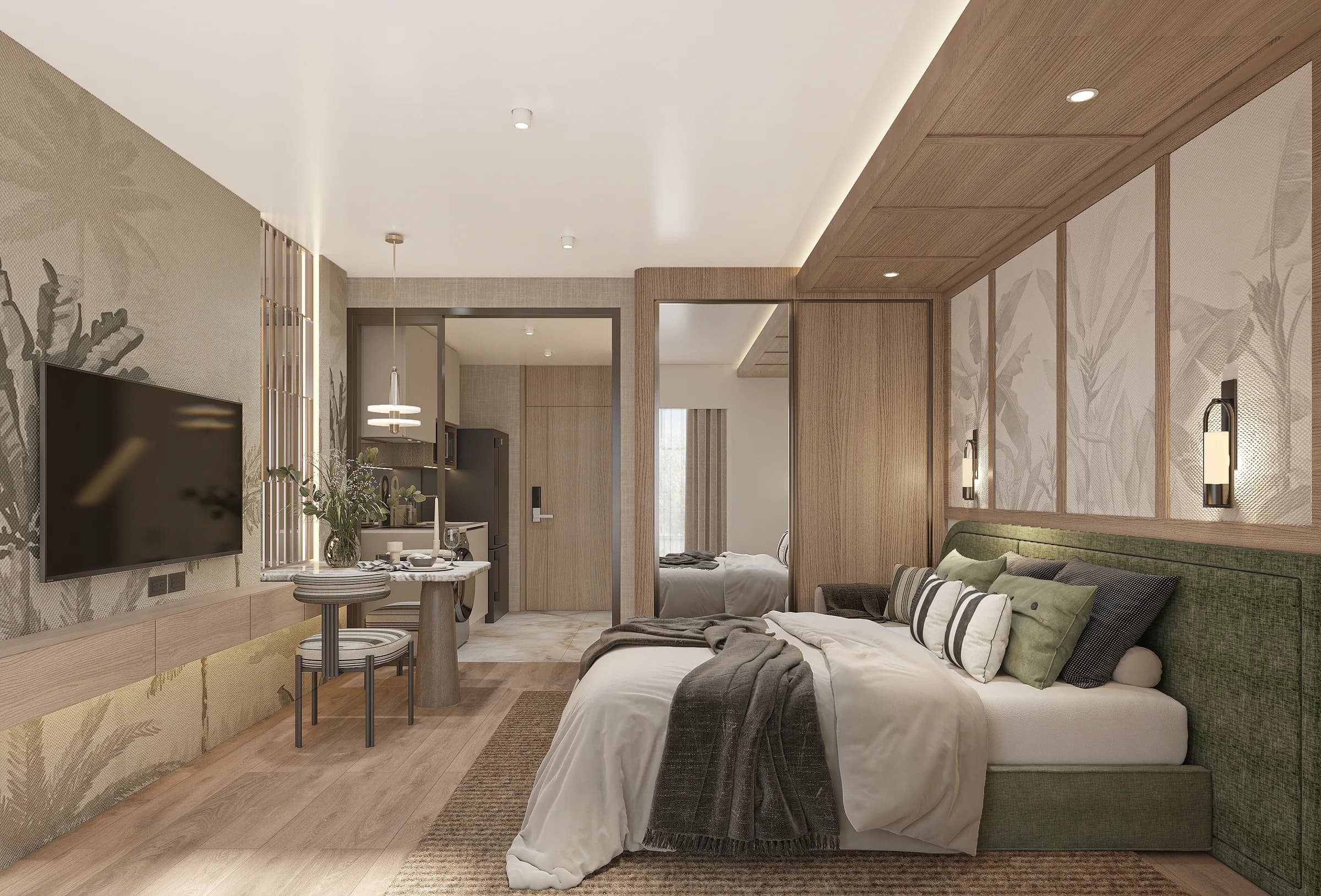 Furnished studio interior at The Astra Samui with a bed, dining table and kitchenette